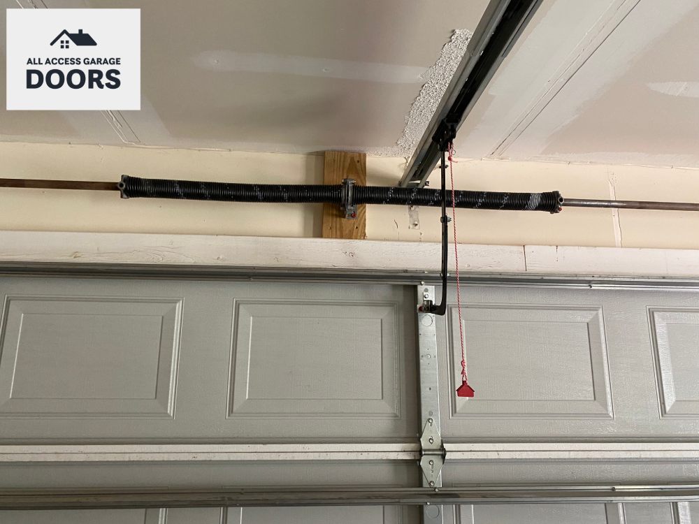 Repairing garage door spring in Thomaston home