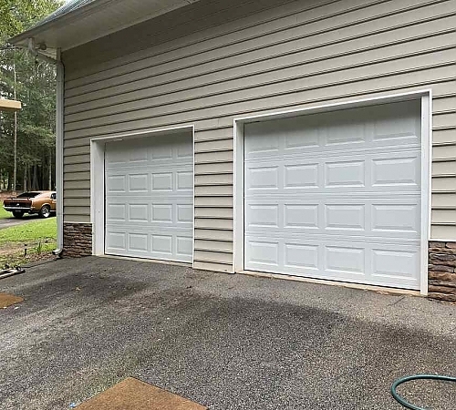 Two sets of independent garage doors 