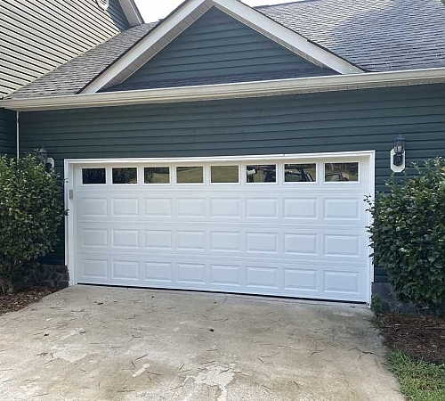  Home garage door with small windows